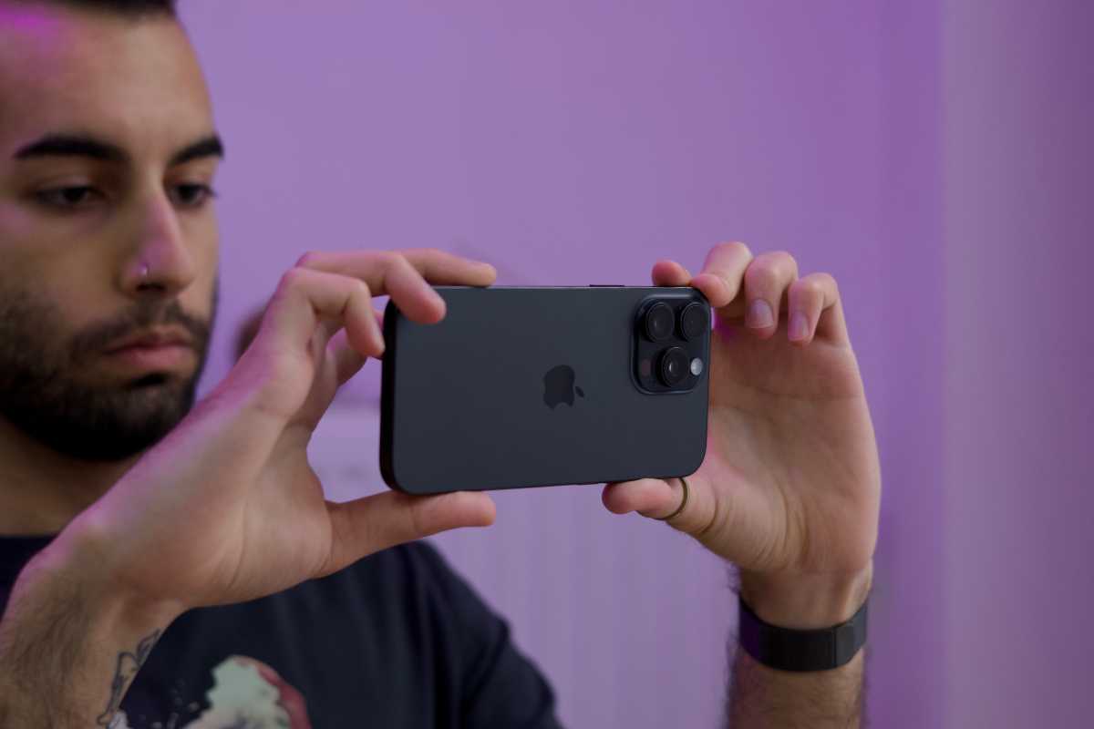 Person shooting with an iPhone 16 Pro Max