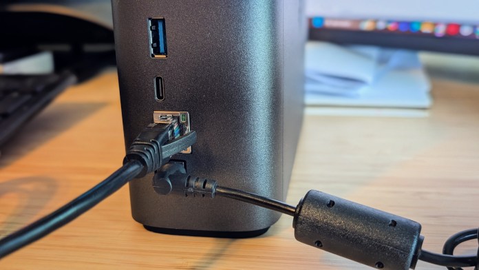 Close-up of the back of the Synology BeeStation Plus showing multiple ports including USB, Ethernet, and power connections.
