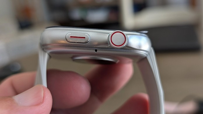 Close-up view of the side of the Runmefit Watch 4 smartwatch, highlighting the buttons and strap.