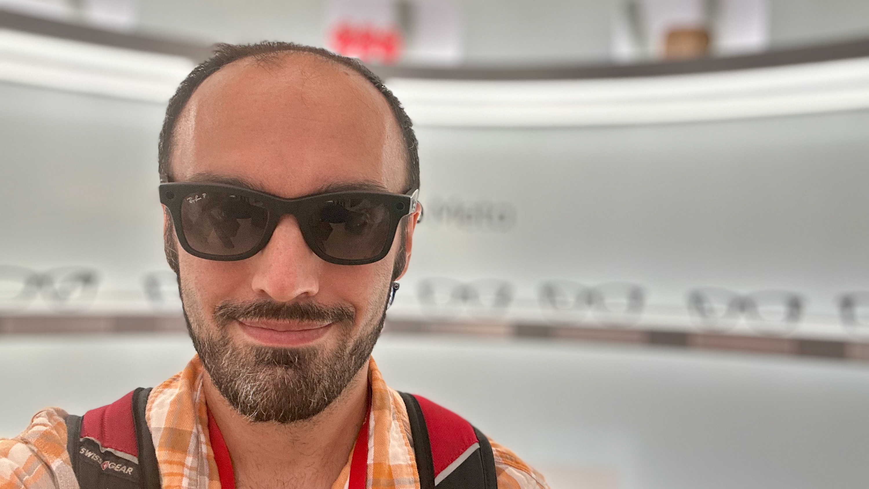 A selfie of the author wearing Ray-Ban Meta (Gen 2) smart glasses with Transitions lenses