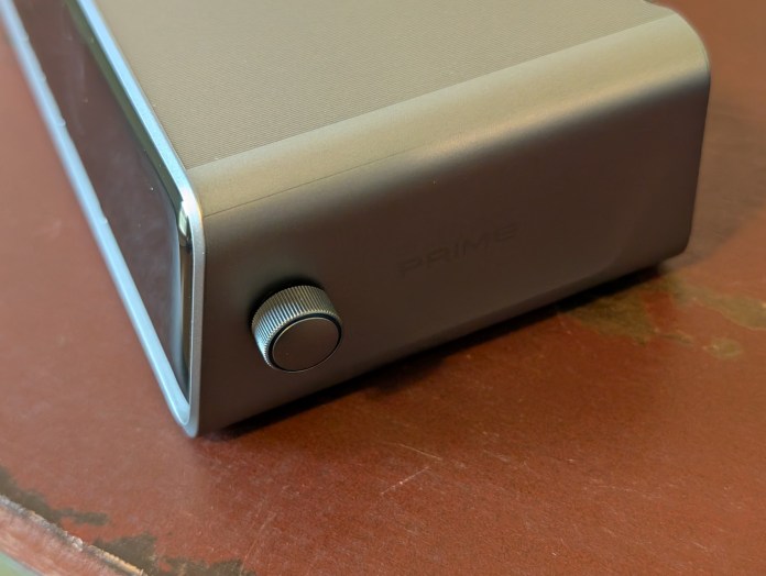 Close-up view of the Anker Prime Docking Station, highlighting its modern retro design, LED display, and adjustable knob.