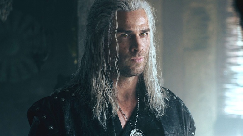 Geralt of Rivia stares at someone offscreen in Season 4 of The Witcher