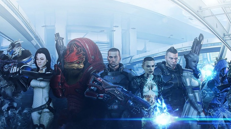 Brandon Keener as the voice of Garrus Vakarian, Yvonne Strahovski as Miranda Lawson, Steve Blum as Grunt, Mark Meer as Shepard, Courtenay Taylor as Jack, Freddie Prinze, Jr. as James Vega, Ali Hillis as Liara T'Soni, and Liz Sroka as Tali'Zorah on the cover of Mass Effect 3