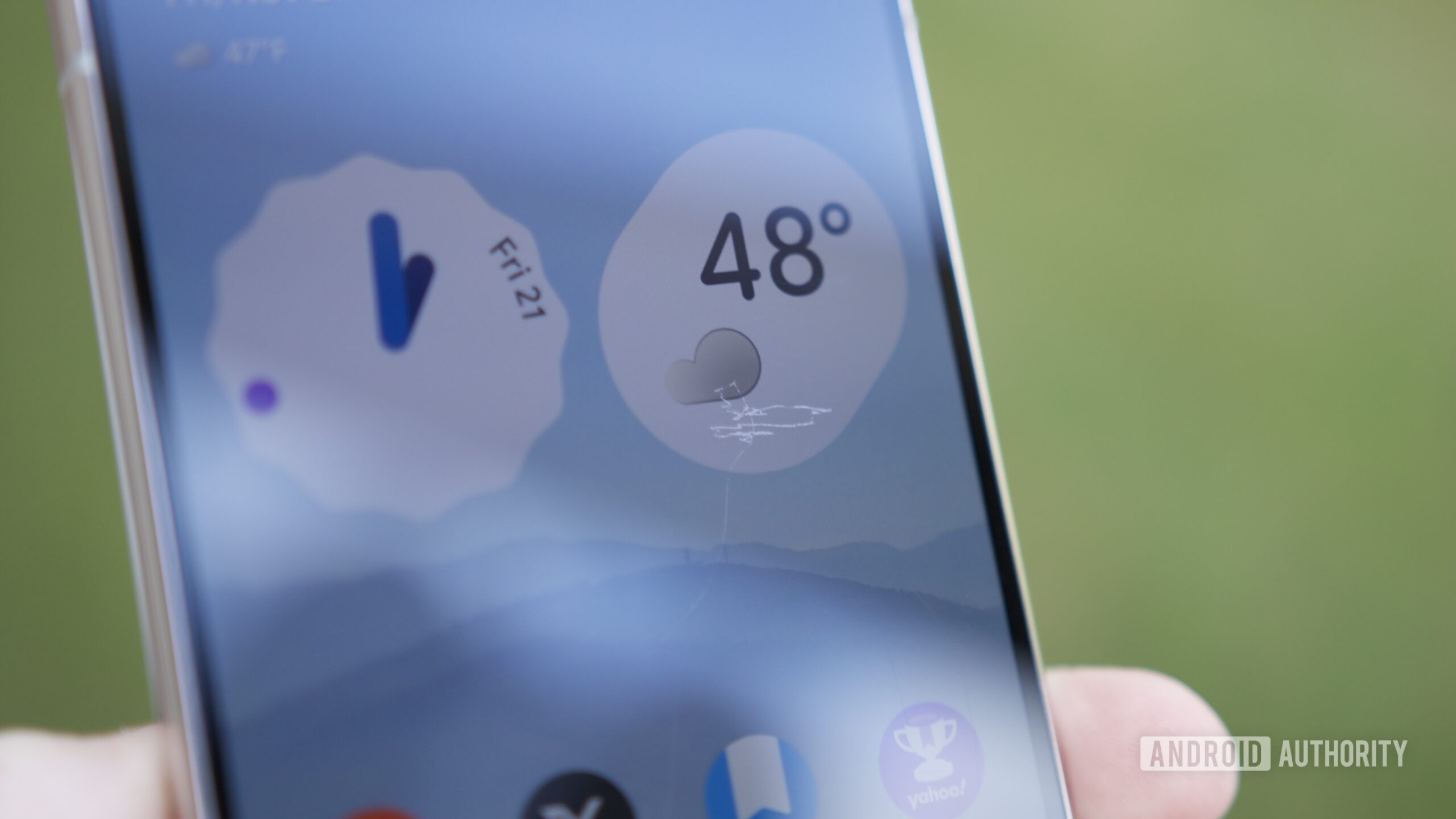 A close-up photo of a Pixel 10 Pro with scratches on its screen.